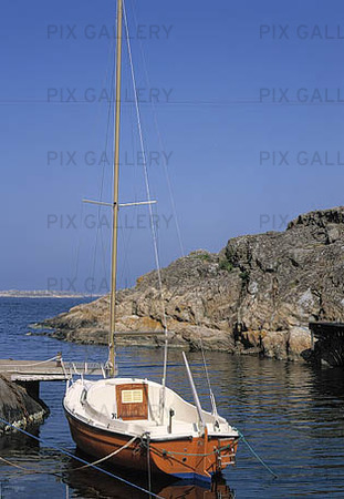 Moored sailboat in bay