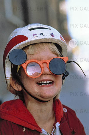 Boy with sunglasses and helmet