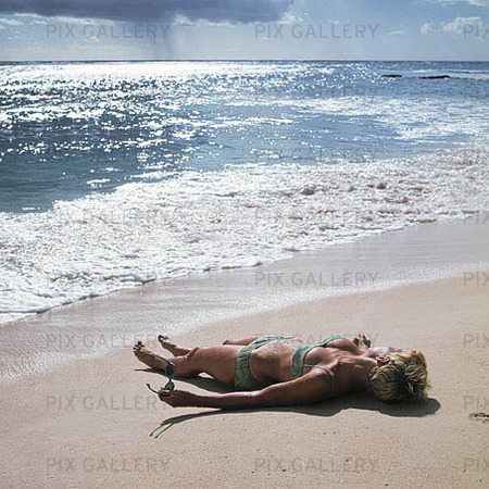 Kvinna på strand