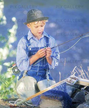 Pojke som fiskar