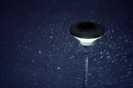 Street Lamp in snowfall at night