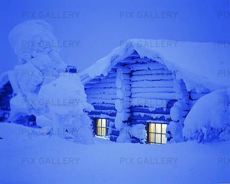 Illuminated Winter cottage