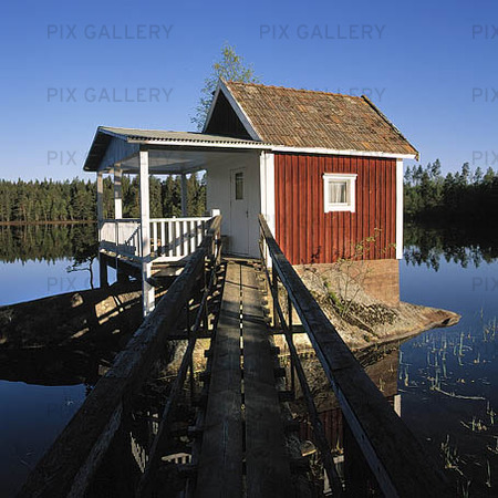 Red cottage at lake