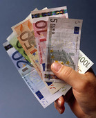 Euro banknotes in hand