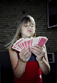 Girl with a deck of cards
