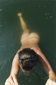 Kvinna som badar