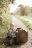 Pojke med resväska