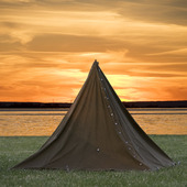 Tält i solnedgång