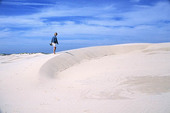 Woman on sand dune