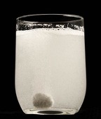 Water glass with effervescent tablet