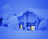 Illuminated Winter cottage