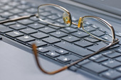 Reading glasses on keyboard