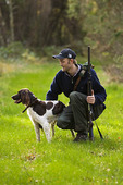 Hunters with dogs